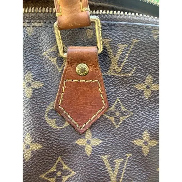 Louis Vuitton Alma Monogram Canvas Handbag Vintage Authentic Lock